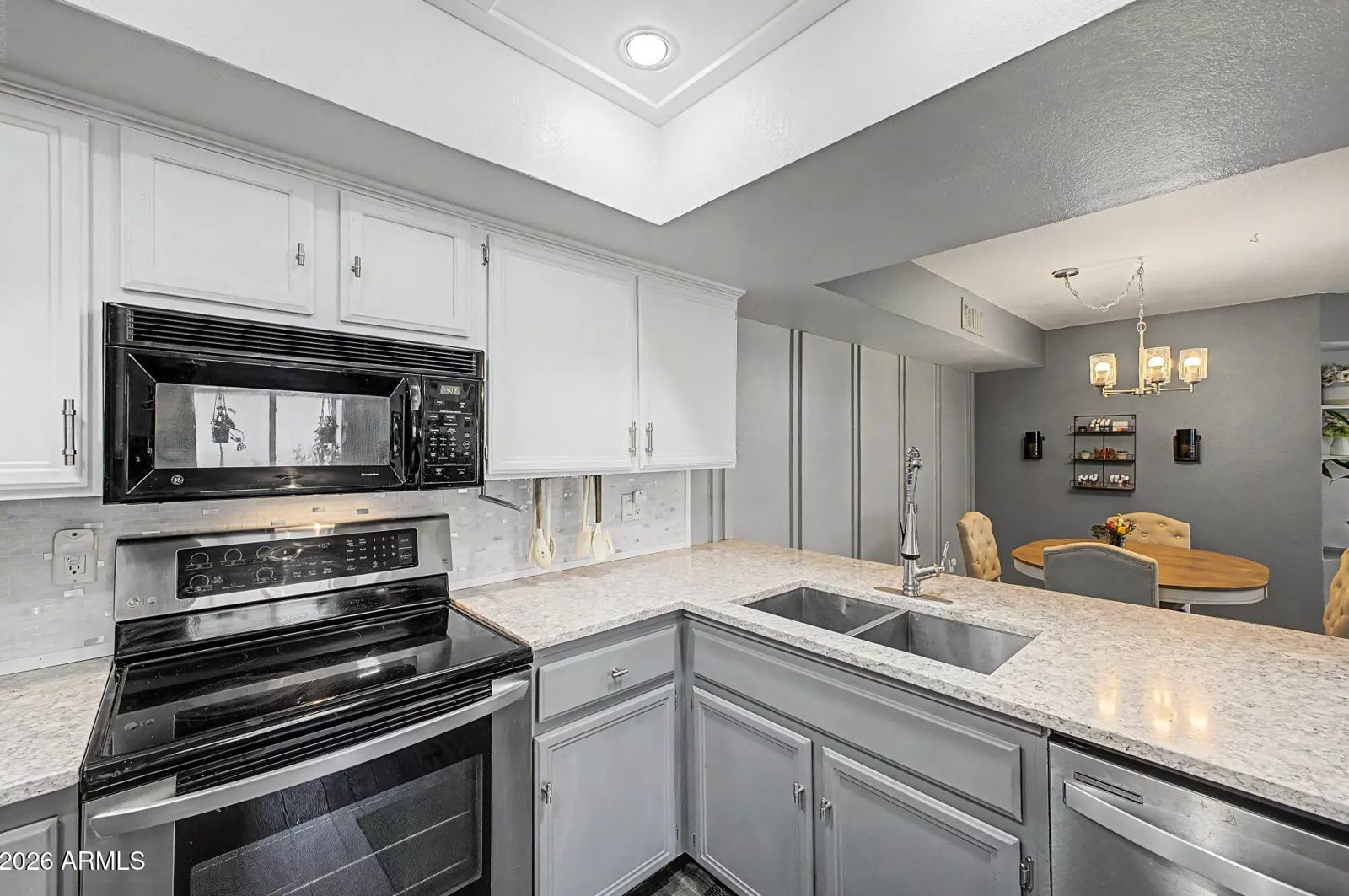 Remodeled kitchen with quartz countertops in a Glendale, Arizona brokerage listing