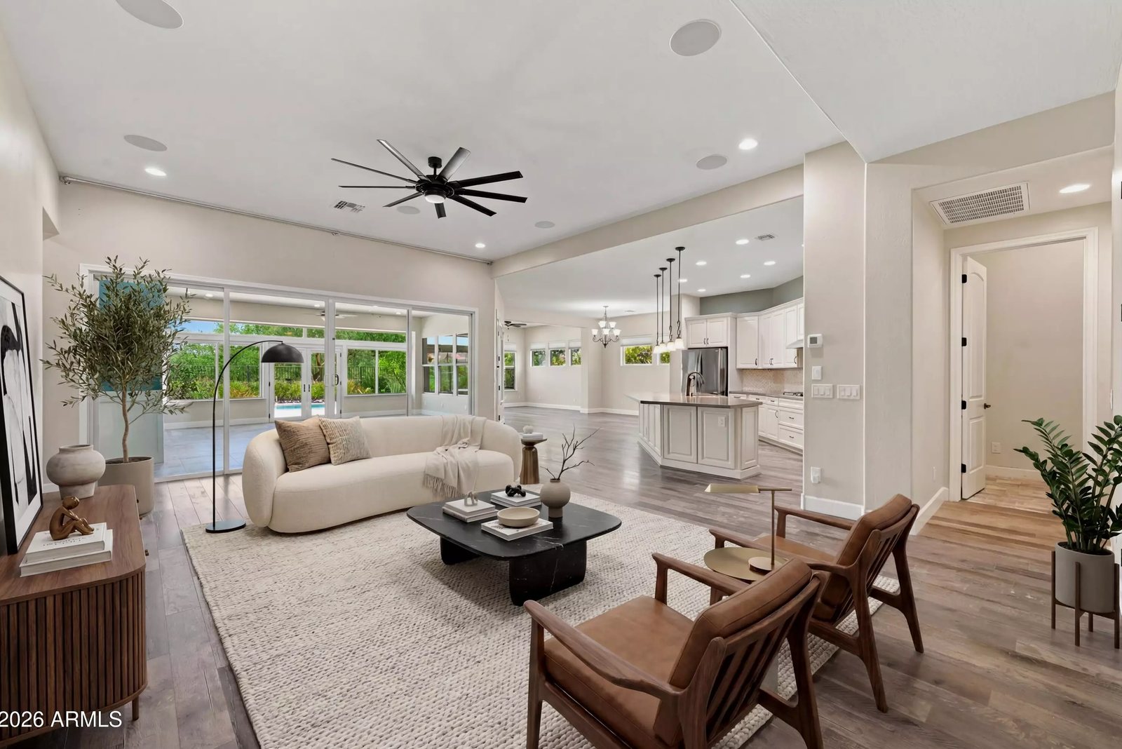 Living room with wood-look flooring in a Litchfield Park, Arizona brokerage listing